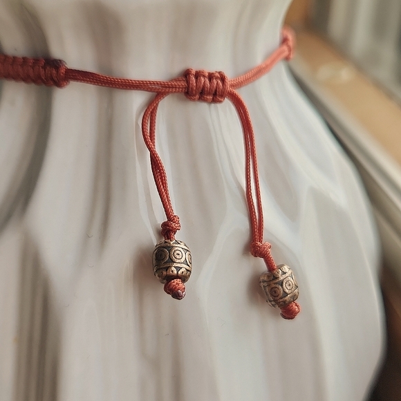 Handmade macrame adjustable bracelet with beads, burnt orange, copper tone beads - Picture 2 of 5